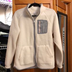 white sherpa zip up